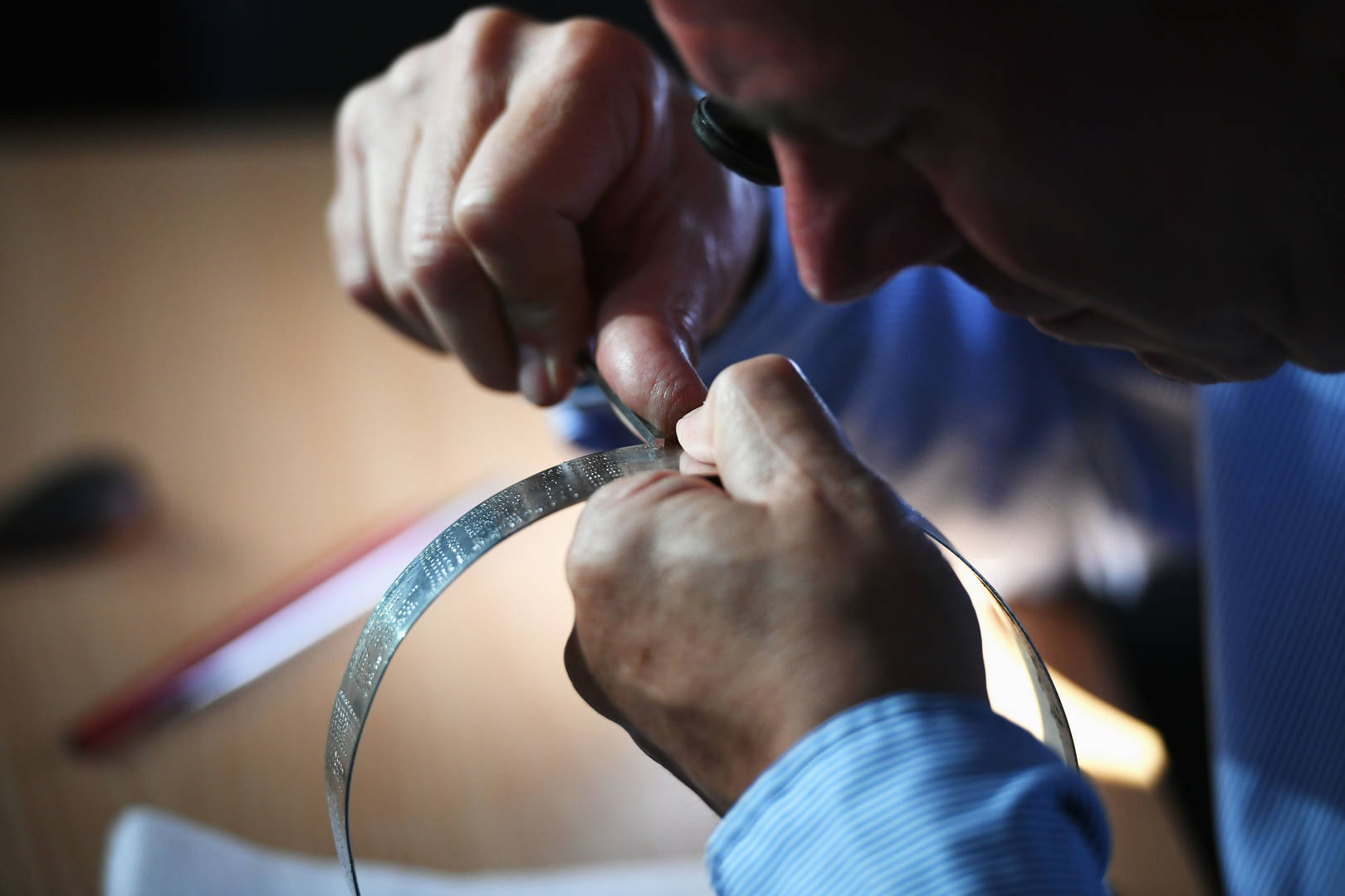 The Claret Jug being engraved